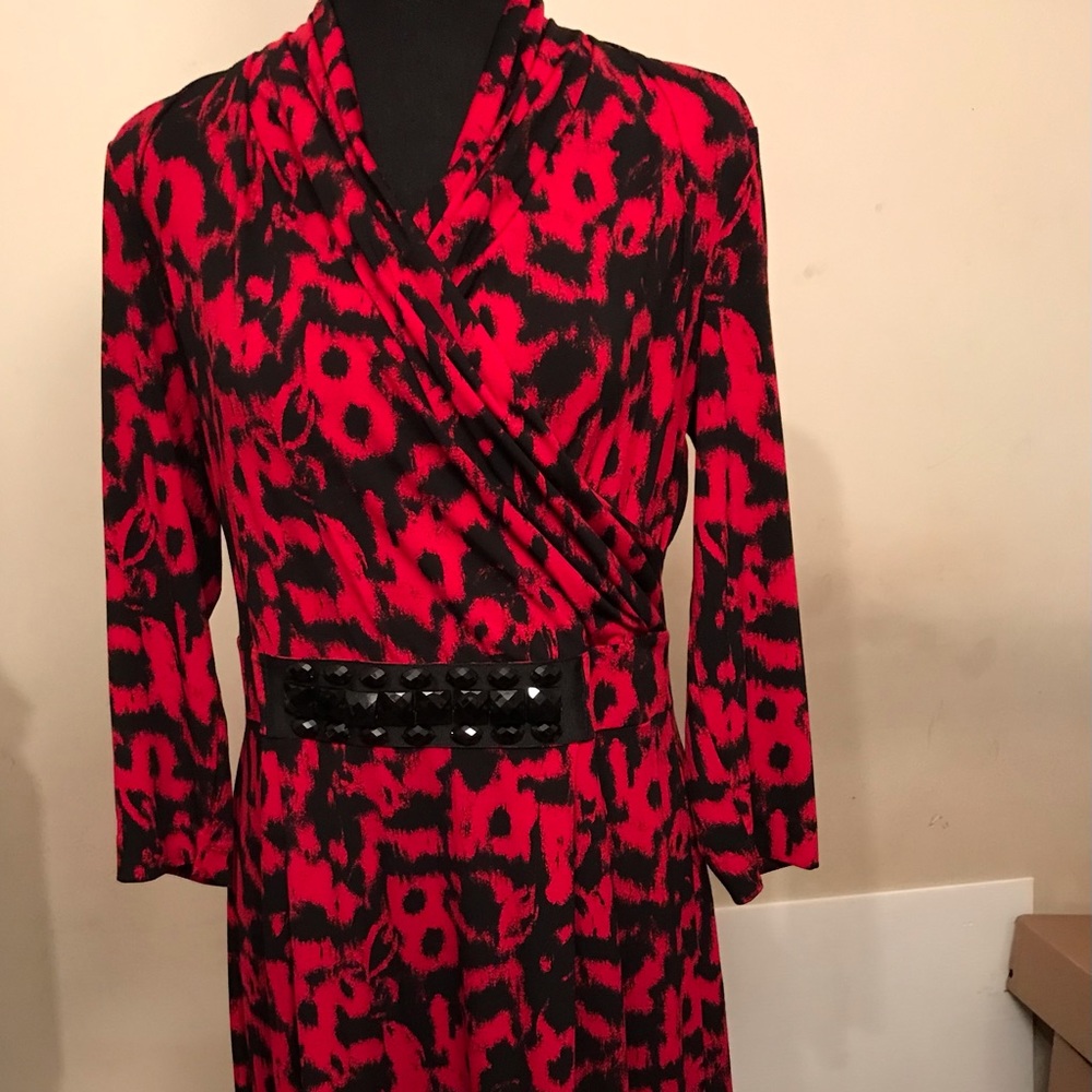 Red and blackV neck dress. Attached belt